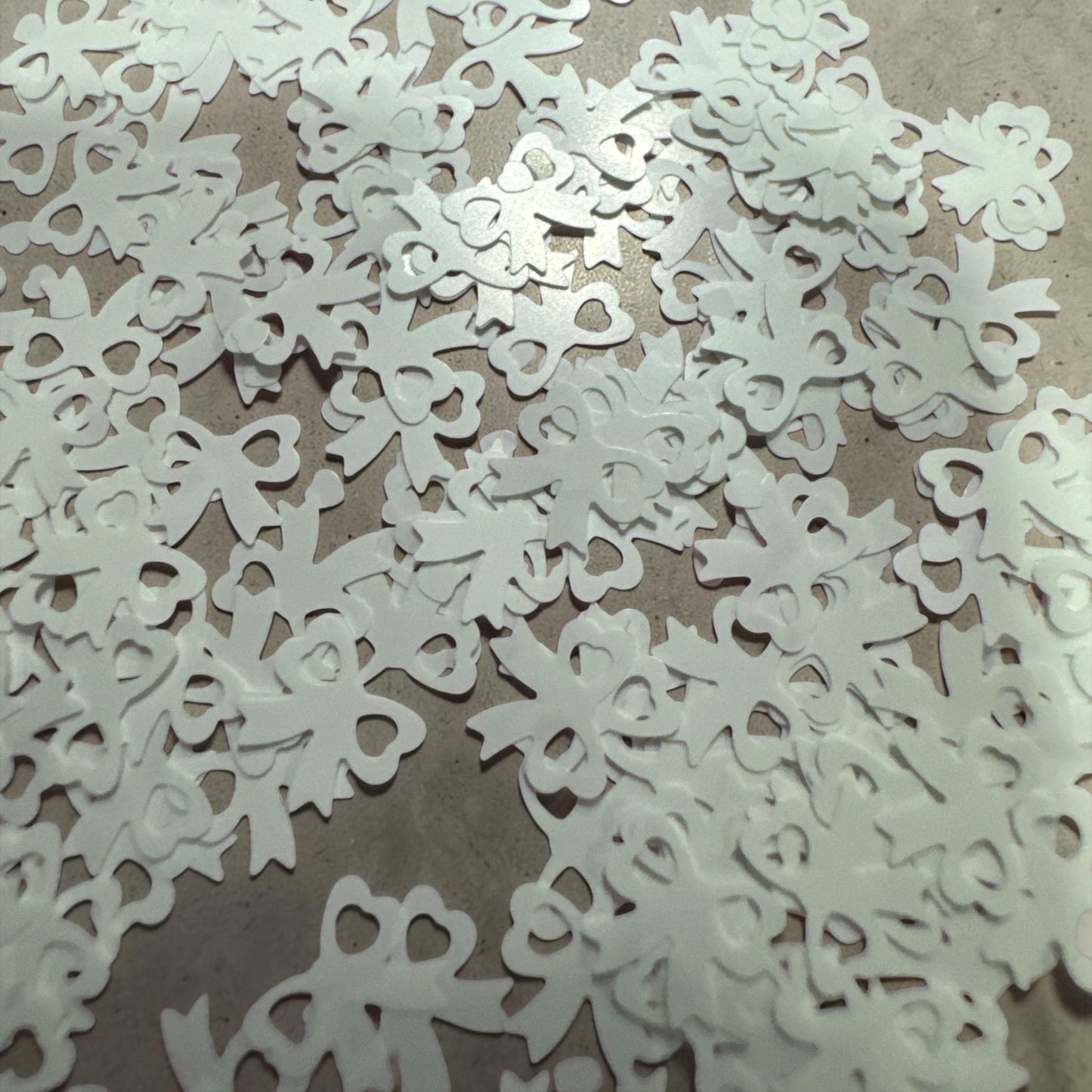 White Bow Shaped Glitter – .5 oz bags